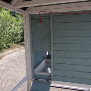 Ouverture du nichoir au enclos