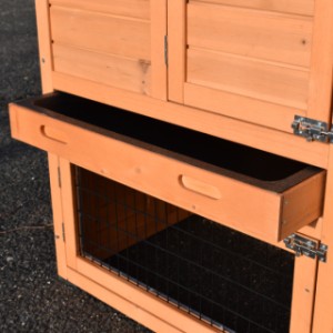 Clapier pour lapin Holiday Small est équipée avec une tiroir pratique