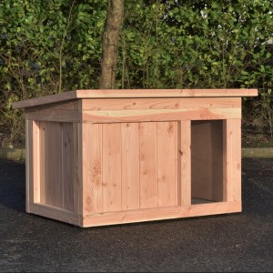 La belle niche pour chien est fabriquée en bois de Douglas