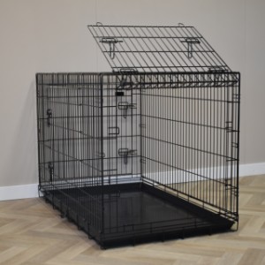 La cage pour chien Strong XXL dispose d’une porte rabattable sur le petit côté