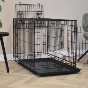 La cage en fil métallique noire Strong L est équipée de 2 portes et 1 trappe supérieure