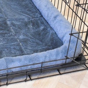 Un coussin assorti est fourni avec la cage pour chiens Profit 63 cm